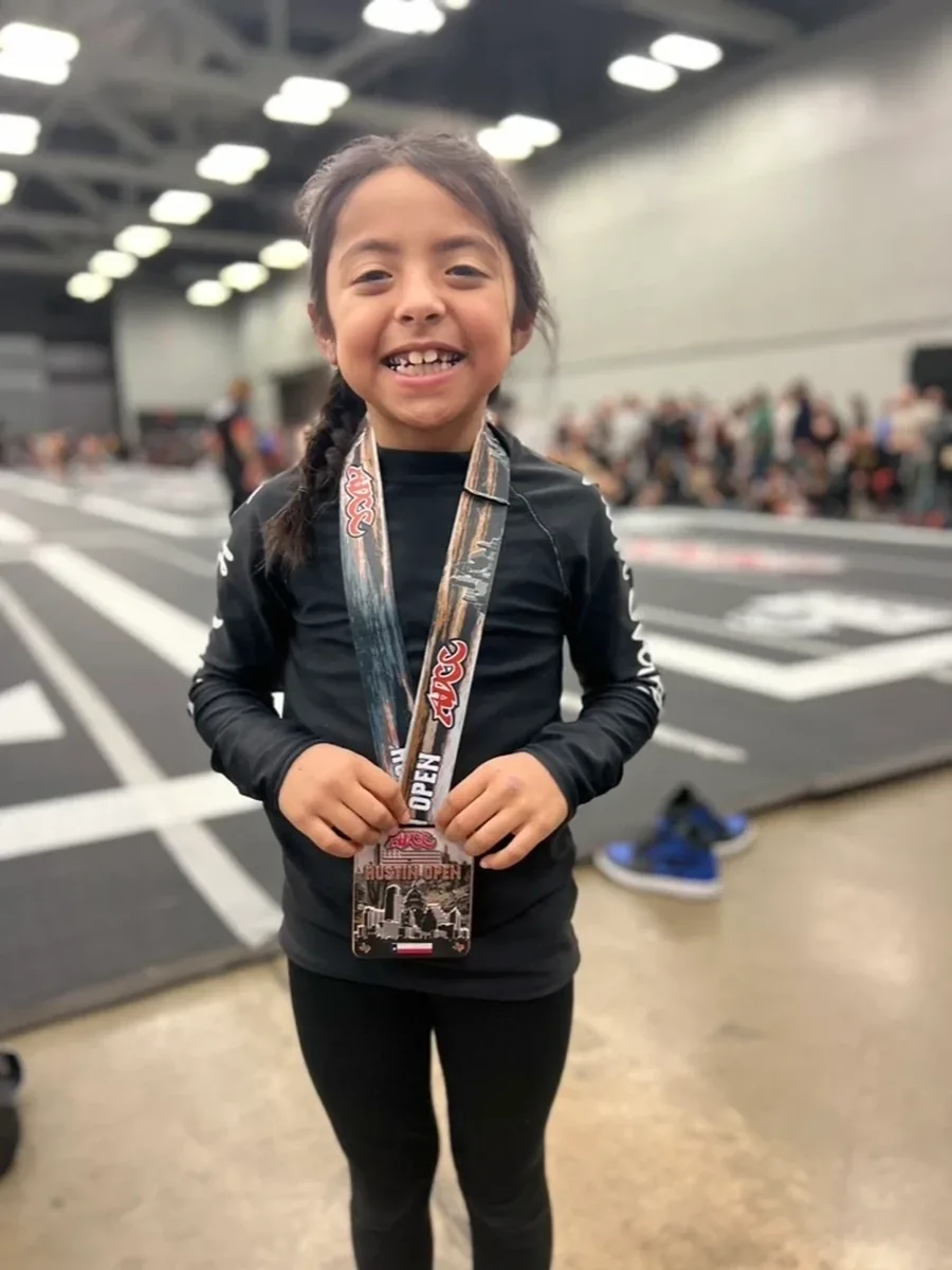 Young 360 BJJ student on the mat
